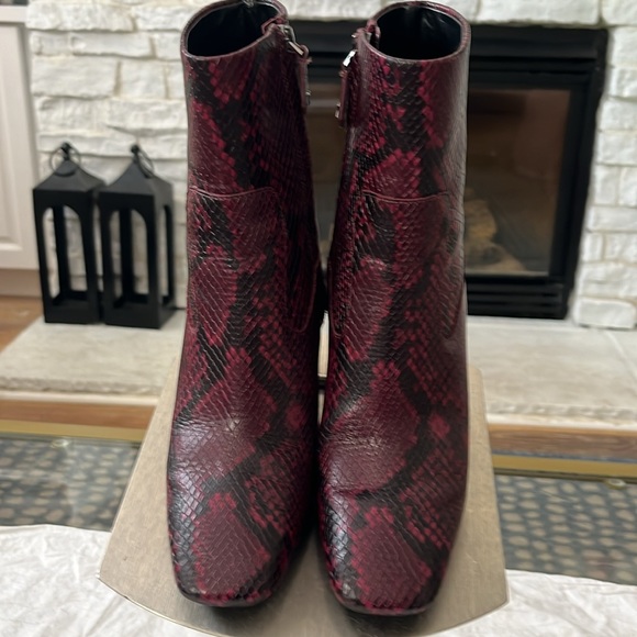 Never Worn Michael Kors 3 1/4” high heel boots with zipper- burgundy/ black col. - Picture 2 of 7